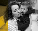 mom comforting a crying child