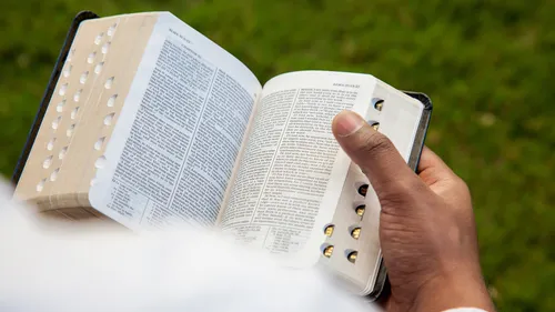person reading scriptures