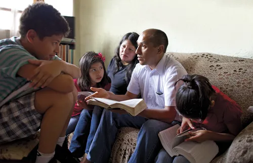 father teaching his family