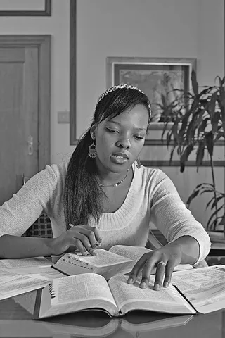Woman studying scriptures