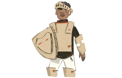 boy dressed up in cardboard armor