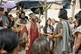 Alma preaches to a crowd