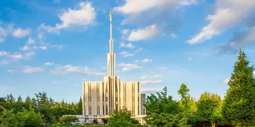 Seattle Washington Temple and grounds.  There are clouds in the sky.