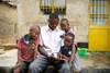 father reading to children