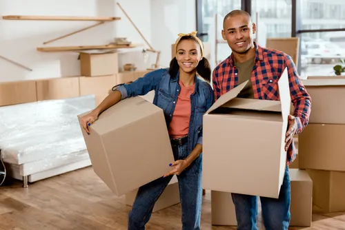 Couple with moving boxes