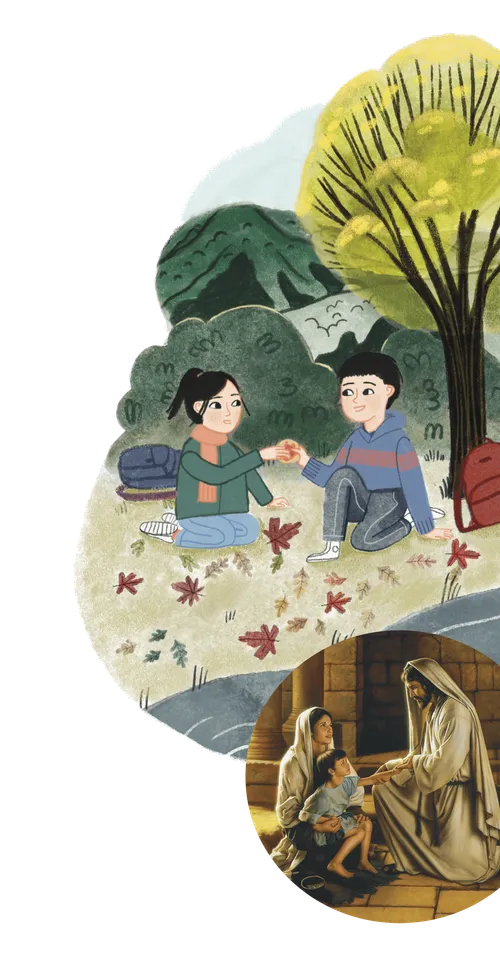 Girl and boy having lunch under a tree