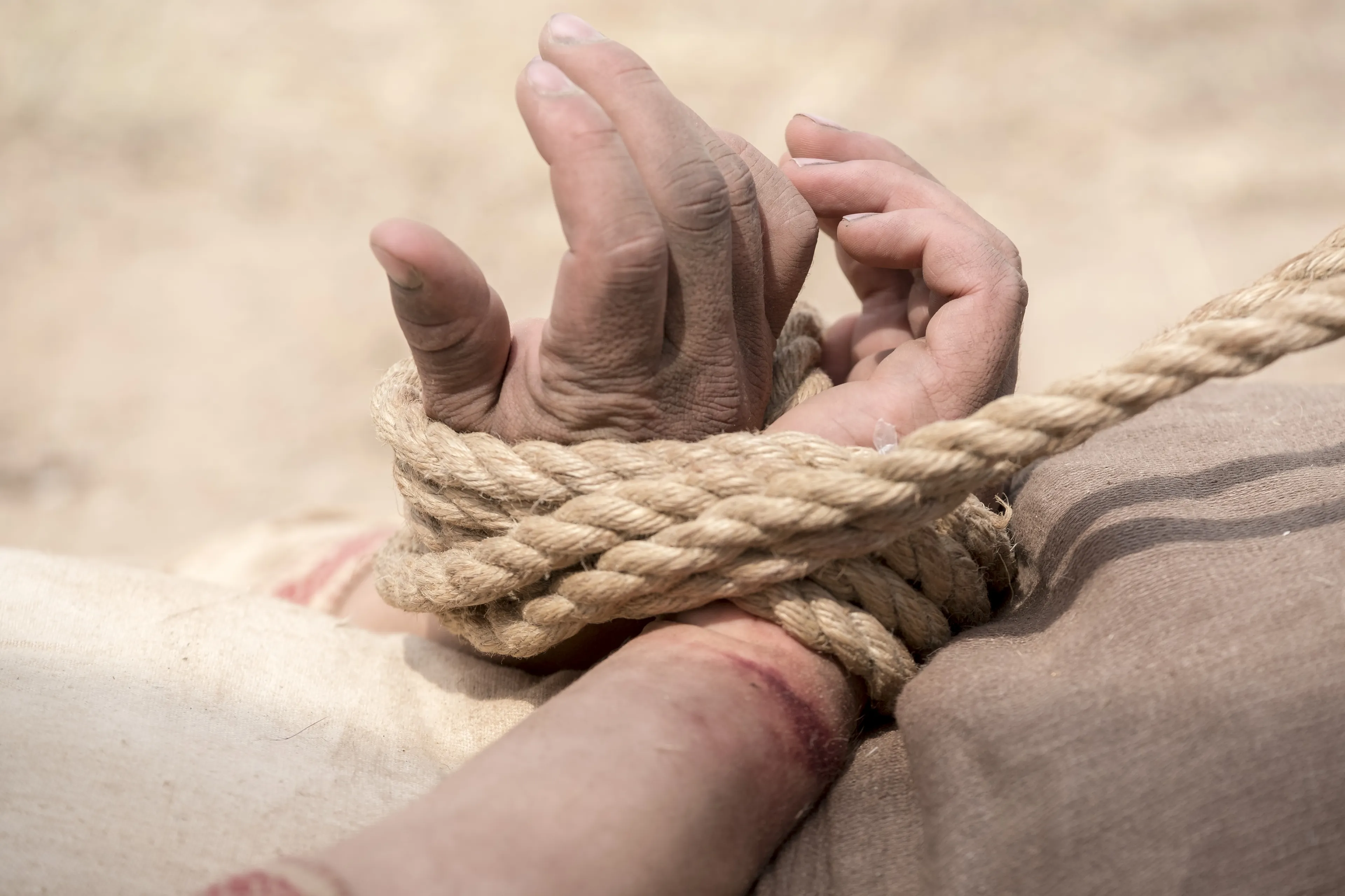 Nephi is bound by his older brothers in the wilderness.