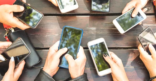 youth with mobile phones