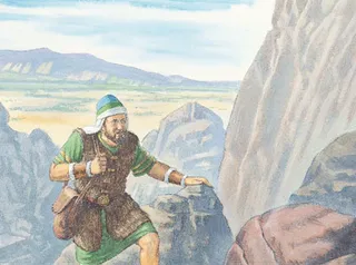 man climbing mountain