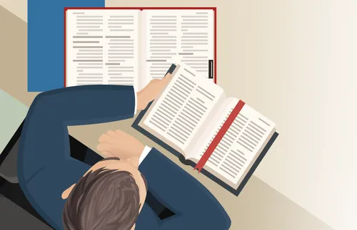 bishop with handbooks and scriptures