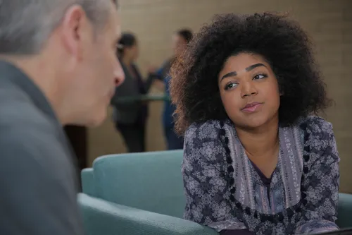 young adult talking with bishop