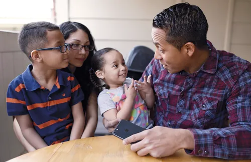 family sitting together and talking