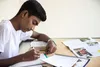 young man in India studying