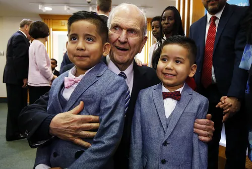 President and Sister Nelson with Church members in England
