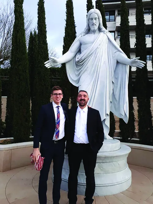 David Parkinson and Michael Talleux in front of the Christus Statue.