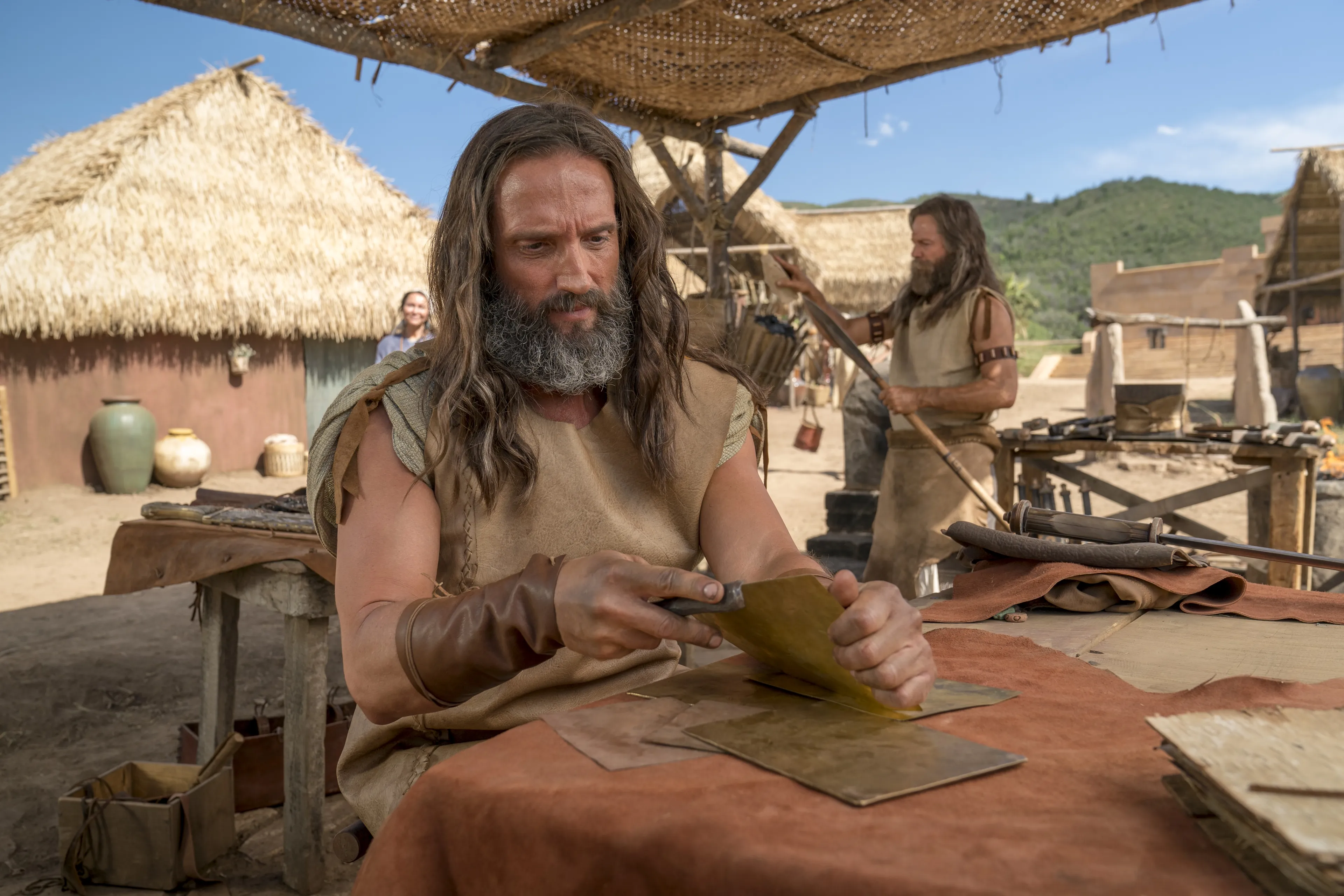 Nephi creates metal plates.