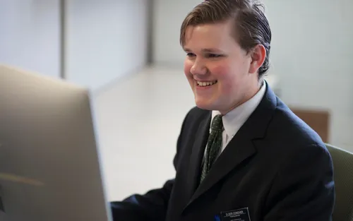 service missionary at computer