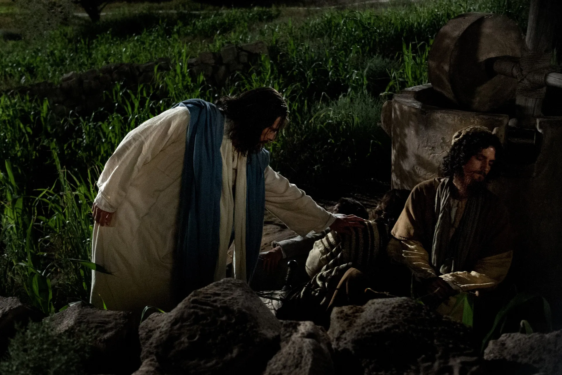 Christ awakens His Apostles who have fallen asleep while waiting.