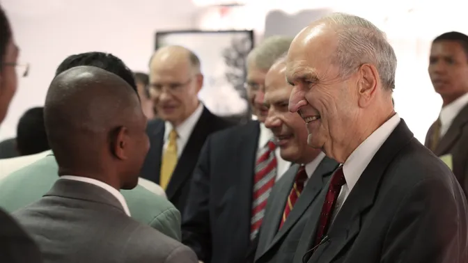 Photos taken during Elder Russell M. Nelson's trip to Southern Africa in 2011.Elder Nelson, Bishop Richard C. Edgley, First Counselor in the Presiding Bishopric, Elder Ronald A. Rasband and Elder Dale G. Renlund, shaking hands at a Priesthood Leadership Conference in Madagascar.Photographer: James (Jim) Dalrymple (Creator ID#: 706311)