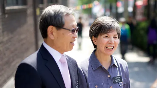 missionary couple talking to people
