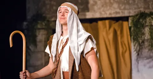 young man dressed as a shepherd