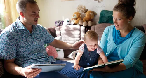parents reading to child