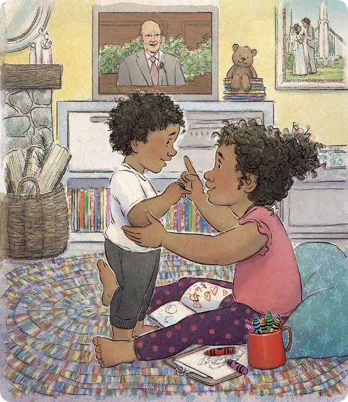 brother and sister watching prophet at general conference