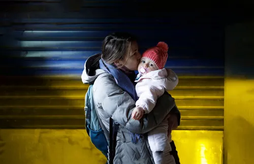 Woman holding a baby