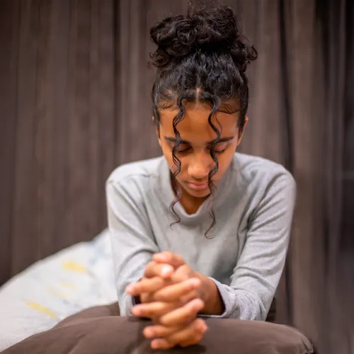 young woman praying