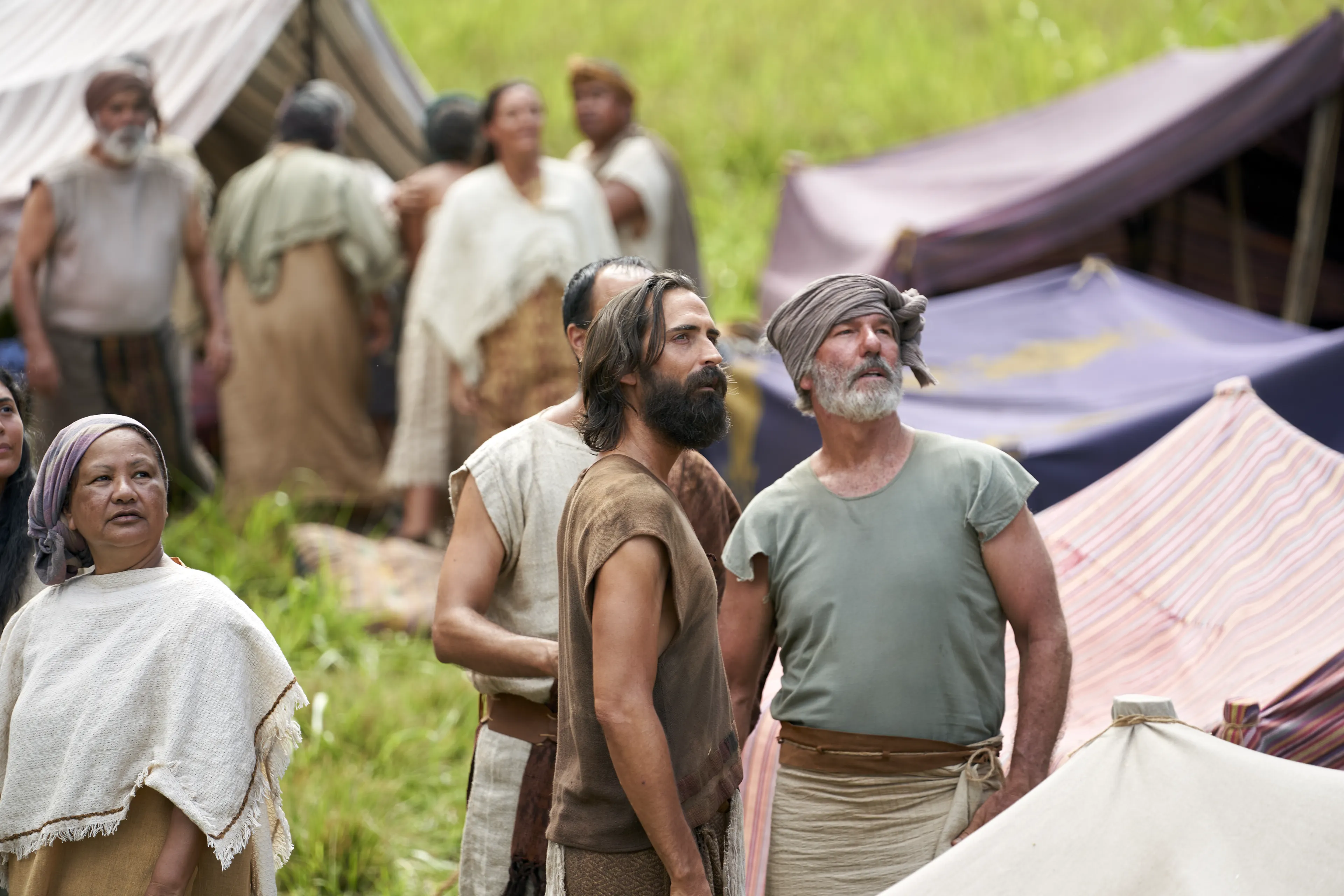 Men and women gather to listen to King Benjamin in the Land of Zarahemla.