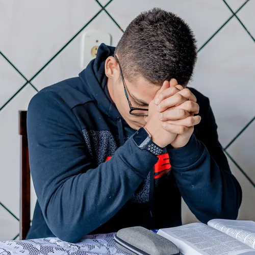 young man praying