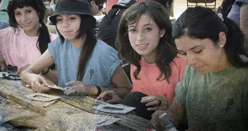A group of young women participating in an activity.