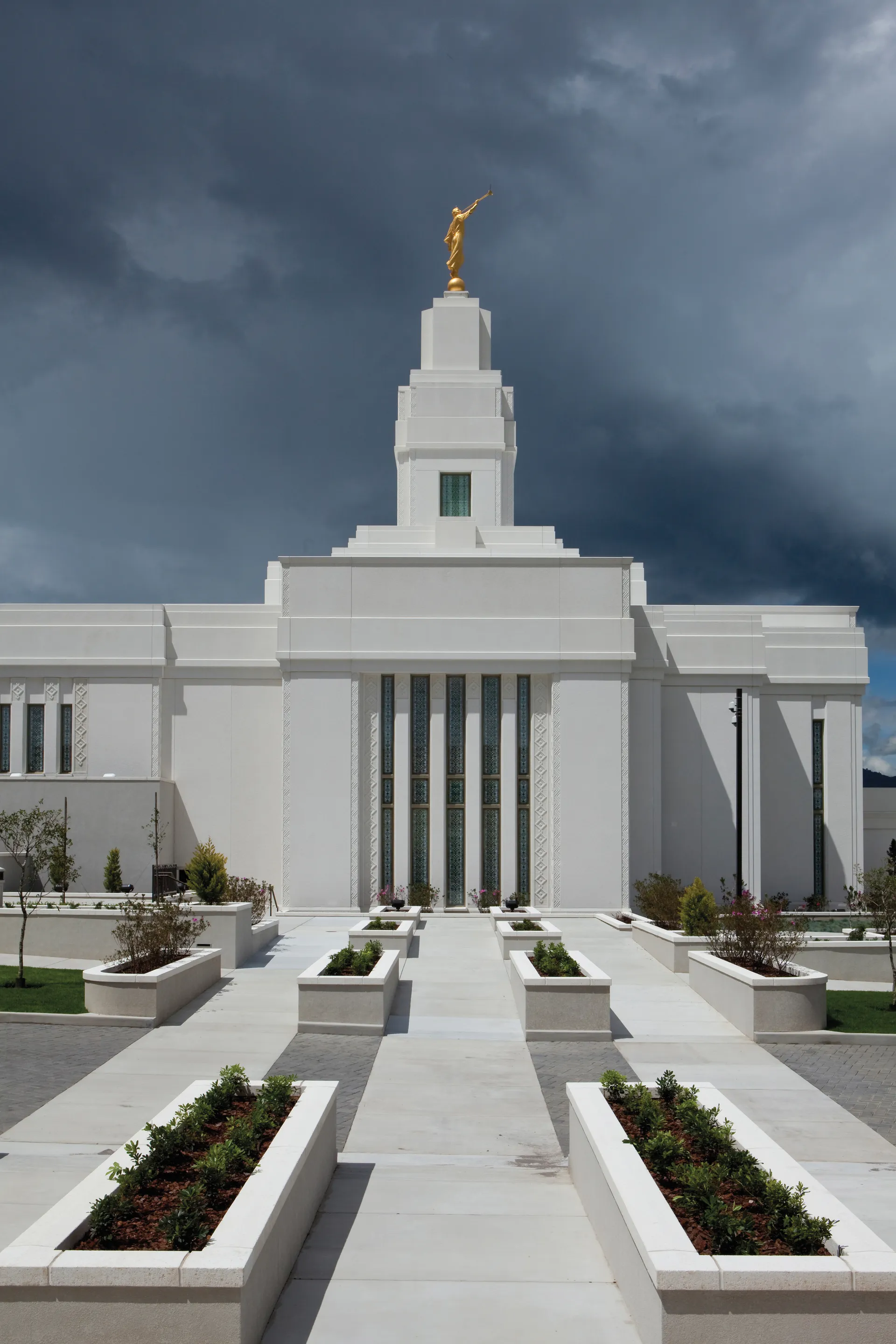 The Quetzaltenango Guatemala Temple side view, including scenery and windows.