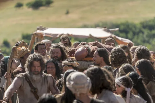 Nephites carry Sherem after he was struck down as a sign from God.