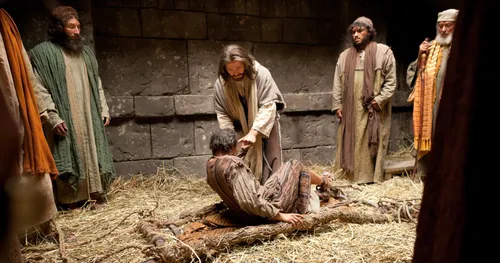 Jesus forgiving and healing a man.