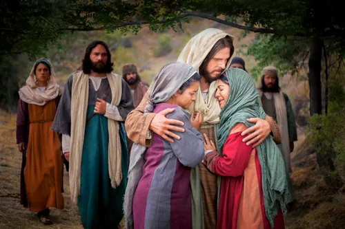 Jesus Christ hugging Mary and Martha