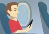 man inside airplane with phone