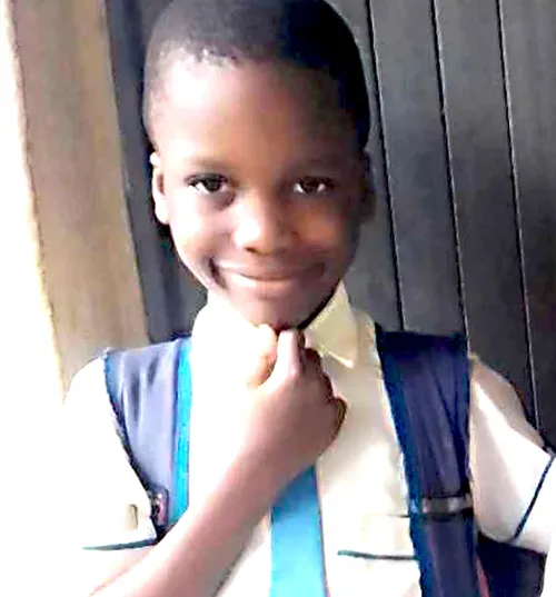 Boy wearing dress shirt and tie