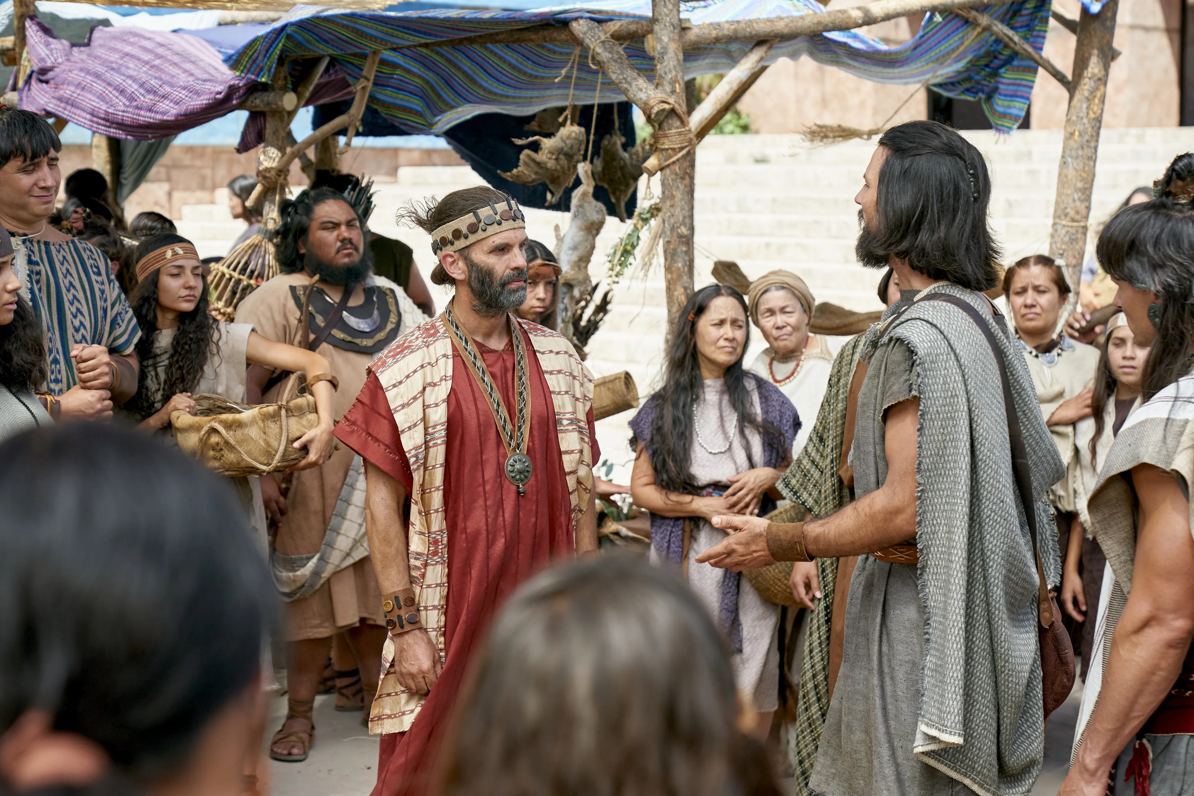 Zeezrom listens as Alma the Younger preaches repentance to the people in the city of Ammonihah.