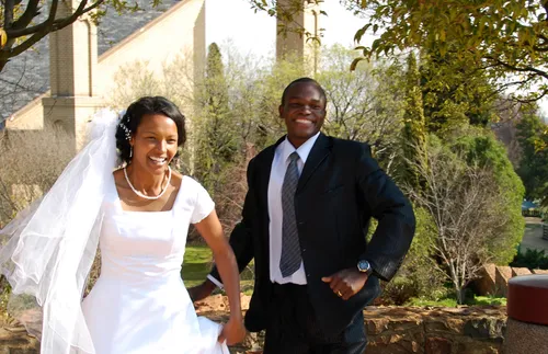 young married couple outside temple