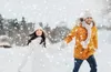 couple running when snowing