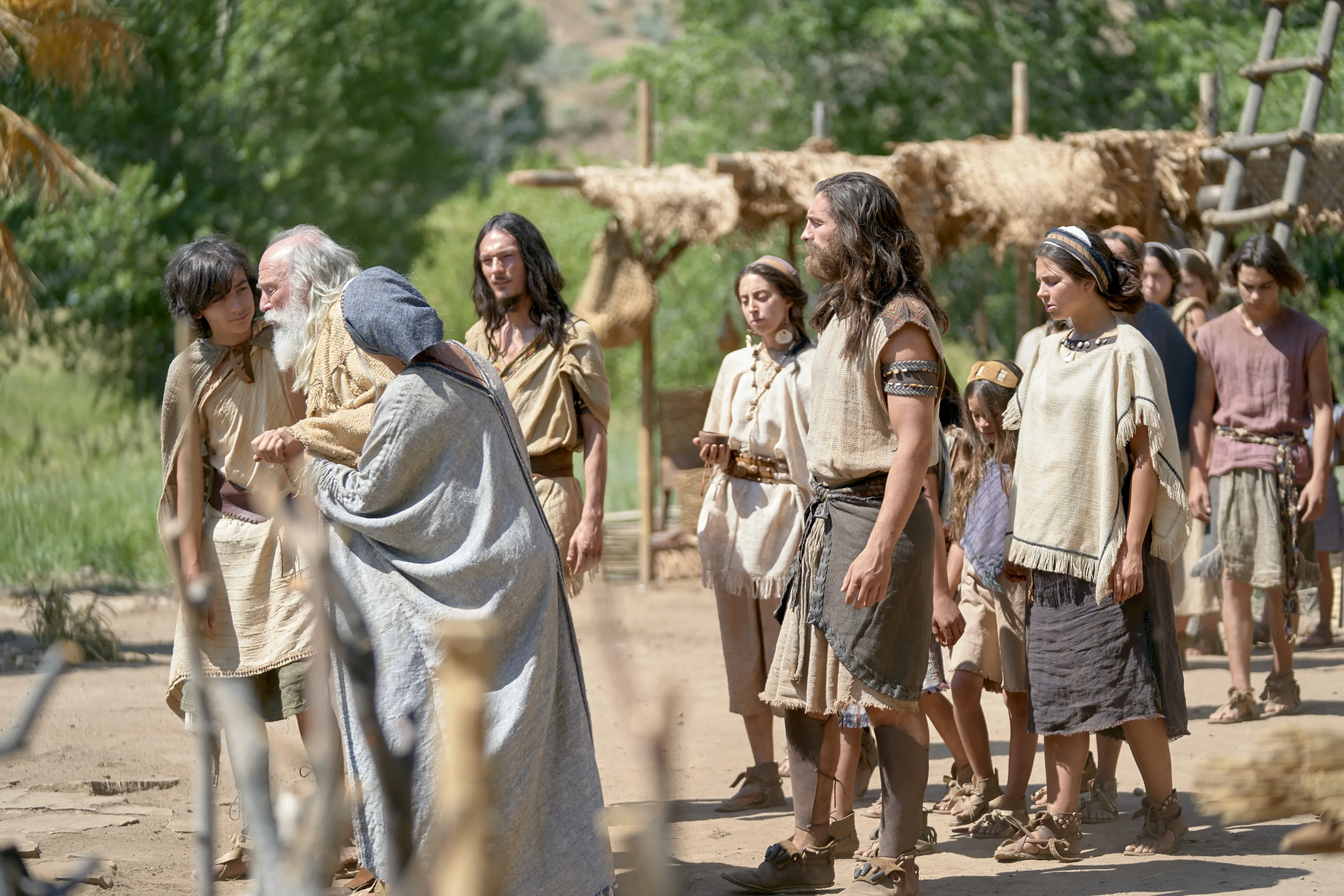 Lehi's family listens as he teaches Jacob.