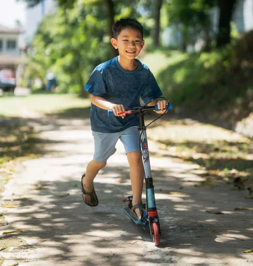 Boy on a scooter