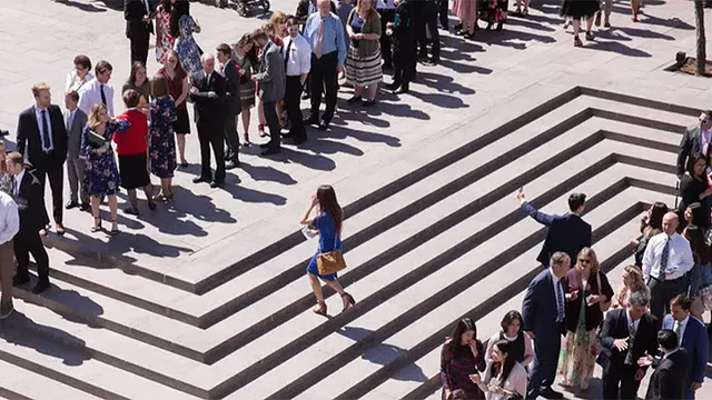 From the 188th Annual General Conference. Families stand together outside the Conference Center.