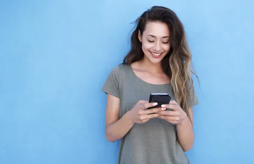 young woman using mobile phone