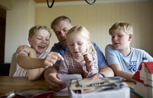 family looking through family photographs