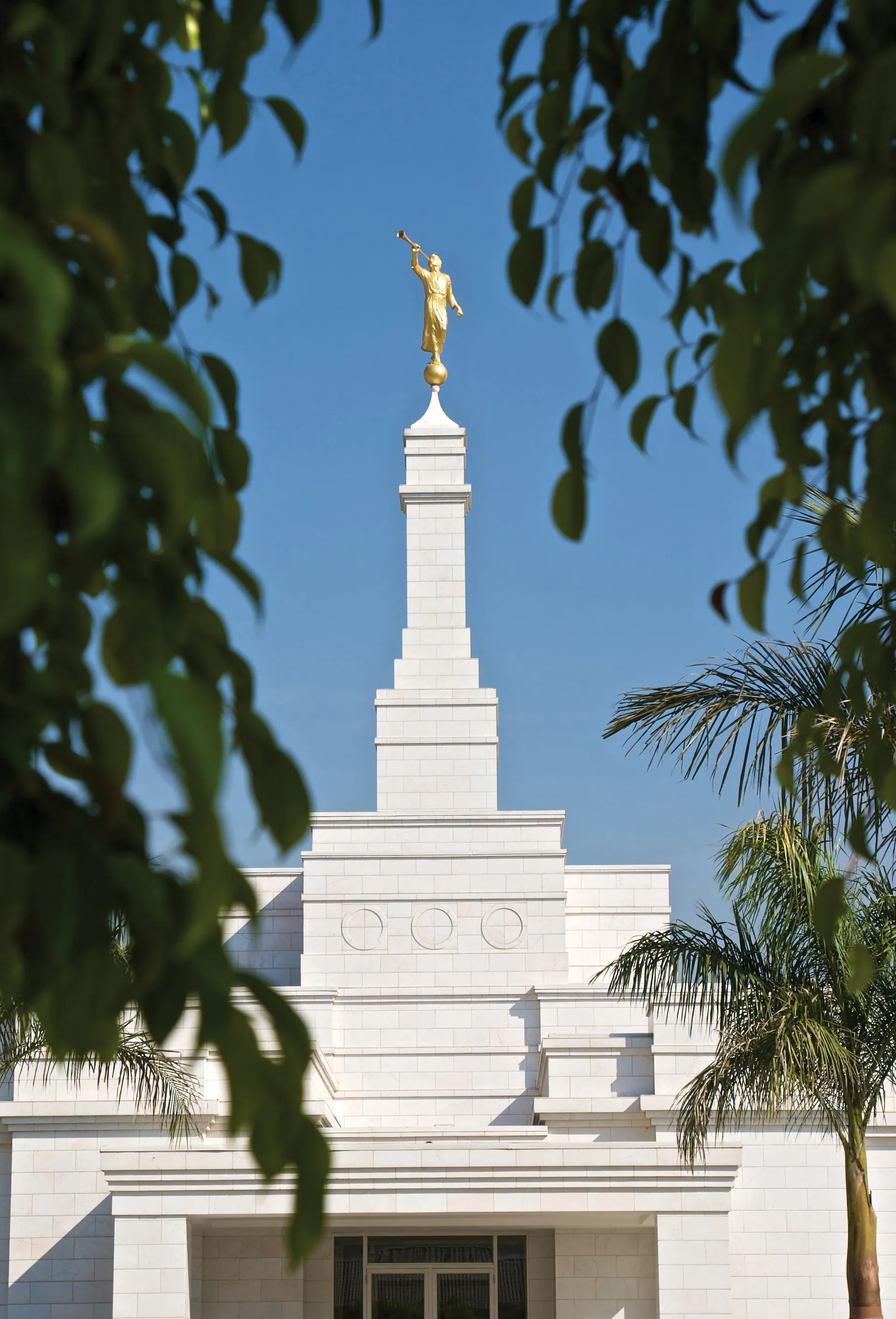 The Oaxaca Mexico Temple spire, including the entrance and exterior of the temple.