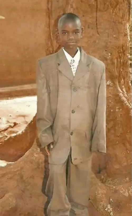 Joseph Ssengooba as a young boy
