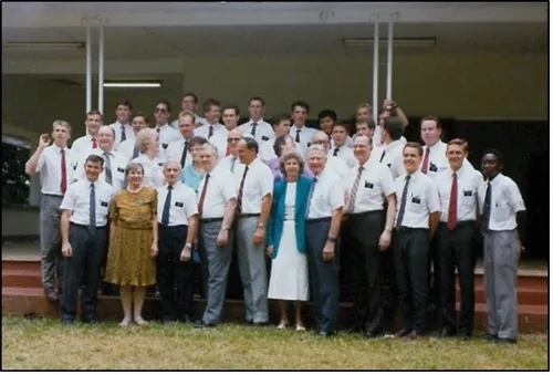 group of people standing outside building