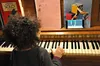 child playing piano